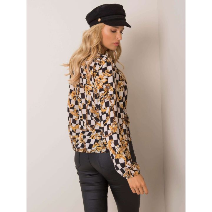 Baltos spalvos palaidinė