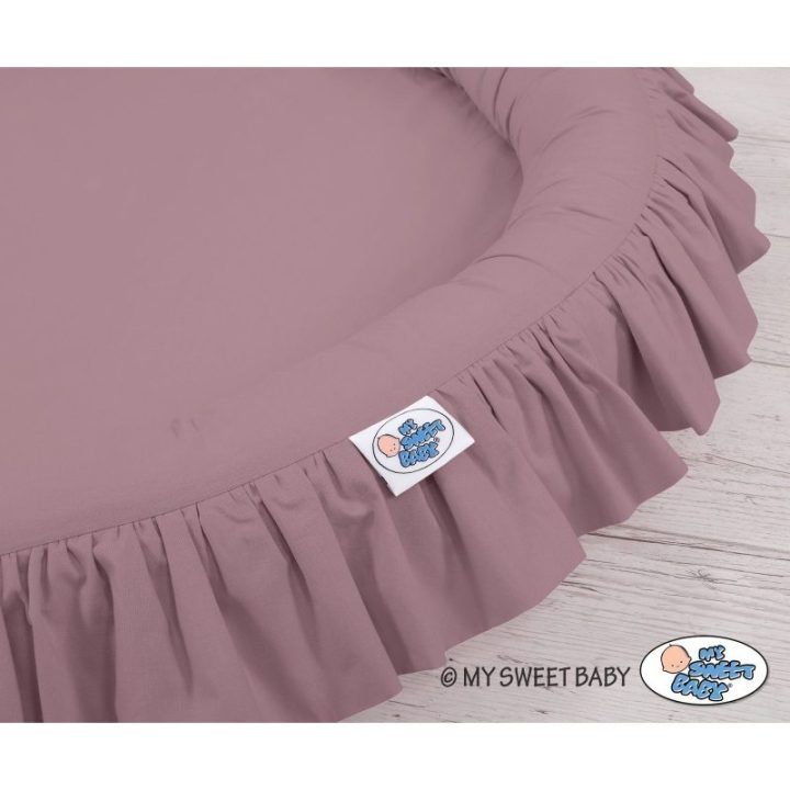 Pakabinama pastelinė violetinė užuovėja su lizdu