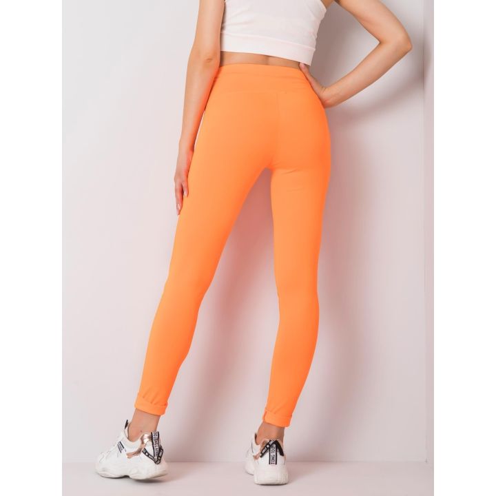 Kelnės fluo oranžinės spalvos