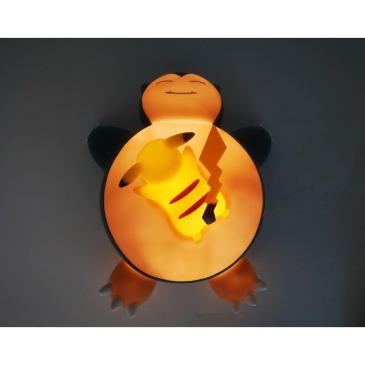 Šviečianti kolekcinė figūrėlė Pokémon su Snorlax ir Pikachu, 25 cm