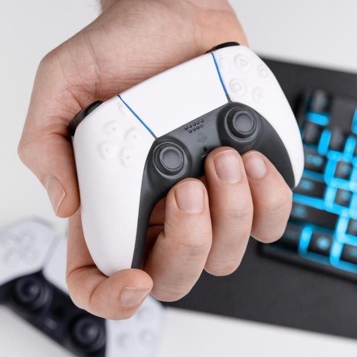 Streso kamuoliukas PS5 pulto formos Paladone Stress Controller, 11 × 7,5 cm, baltas