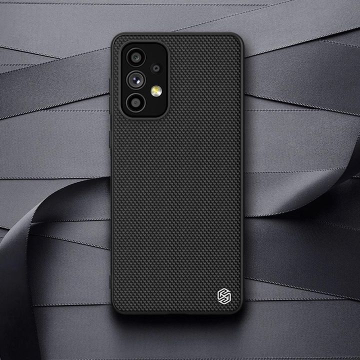 Nillkin Textured Case patvarus sustiprintas dėklas su gelio rėmeliu ir nailonine nugarėle Samsung Galaxy A73 , juodas