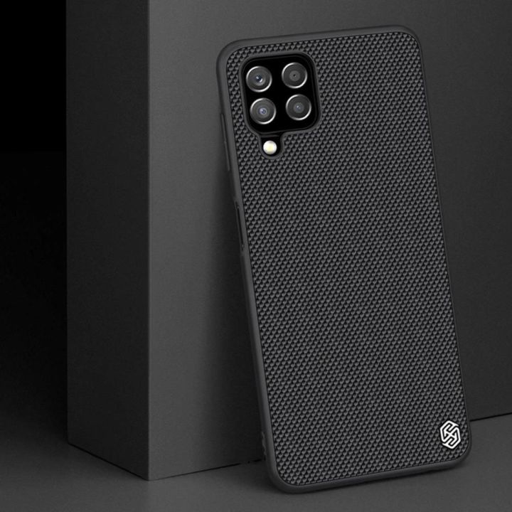Nillkin Textured Case tvirtas dangtelis su gelio rėmeliu ir nailonu ant nugarėlės Samsung Galaxy A22 4G , juodas