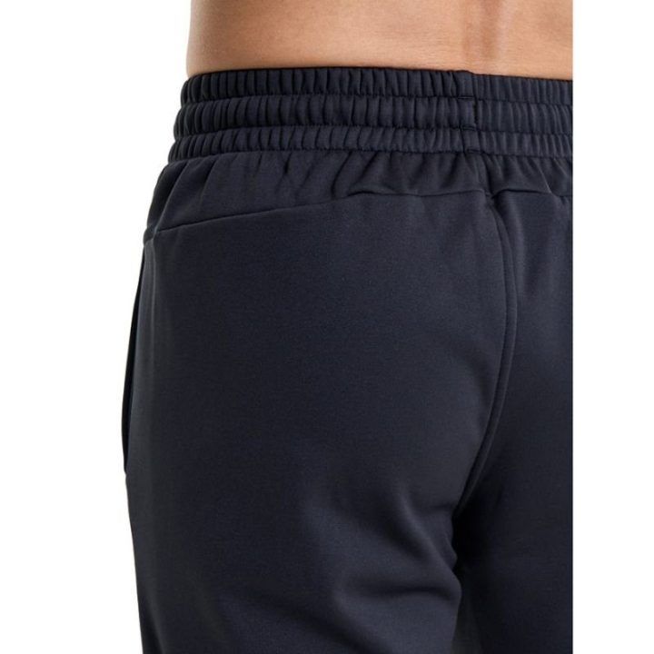 Vyriškos laisvo kirpimo sportinės kelnės Under Armour, juodos