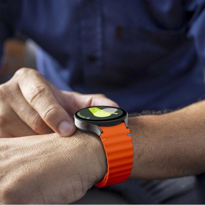 silikoninė sportinė apyrankė Samsung Galaxy Watch 4 / 5 / 5 Pro / 6 / 7 / FE - oranžinė