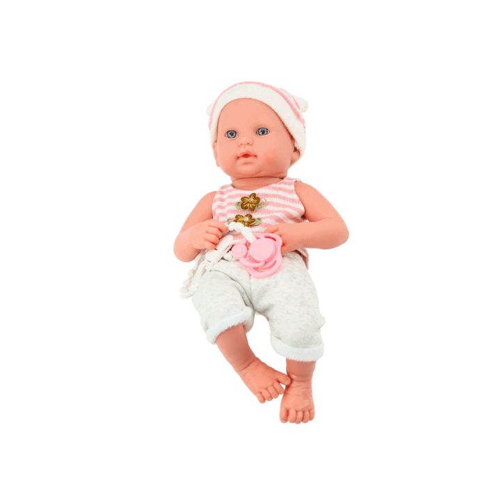 Baby doll in white and pink clothes, hat, pacifier, and blanket