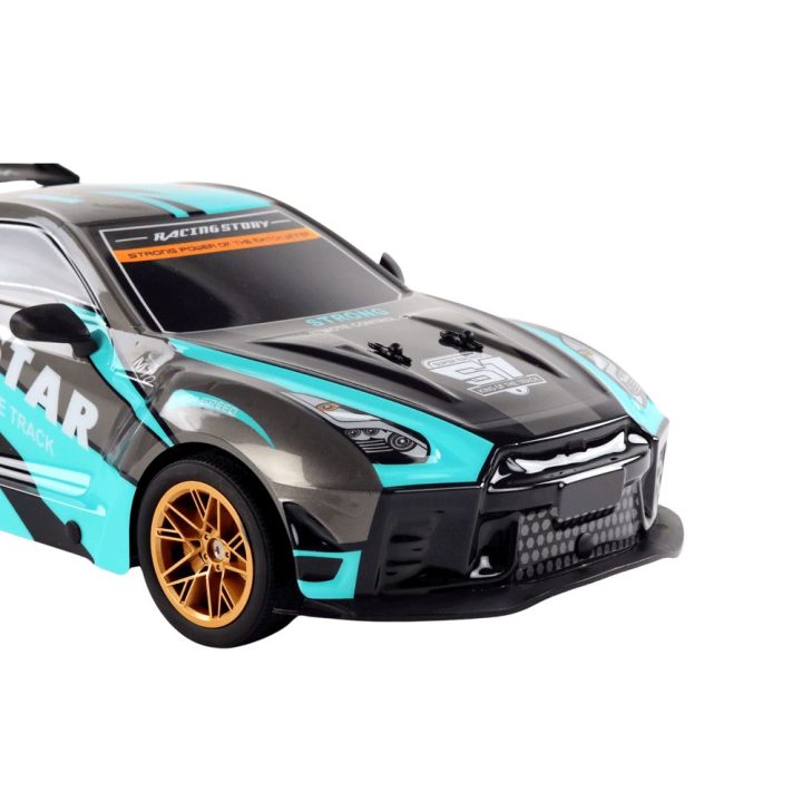 Automobilis radijo bangomis 1:10 sportinis – greičiui ir pramogai lauke.