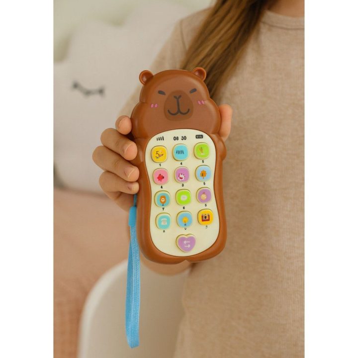 Žaislinis telefonas su garsais ir melodijomis Capybara – smagiam mokymuisi žaidžiant.