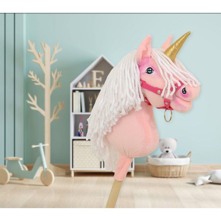 Hobby Horse vienaragis ant lazdos rožinis su balta karčiene ir auksiniu ragu