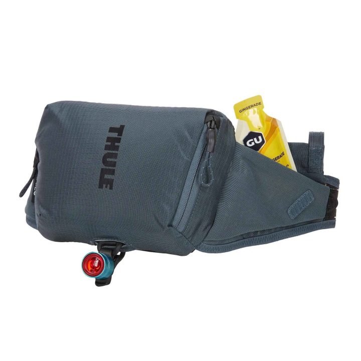 Thule Rail juosmens krepšys, tamsiai pilkas, 0,5 l
