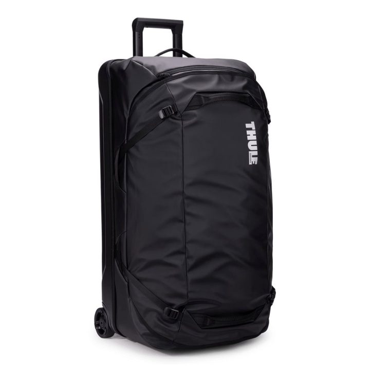Juodas ratinis kelioninis krepšys Thule Chasm 110 l