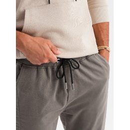 Vyriškos pilkai rusvos jogger tipo kelnės su raišteliu