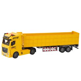 Geltonas žaislinis transporto sunkvežimis su pakeliama priekaba, šviesomis ir garsais