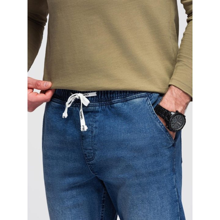 Vyriškos mėlynos jogger tipo kelnės su washed efektu